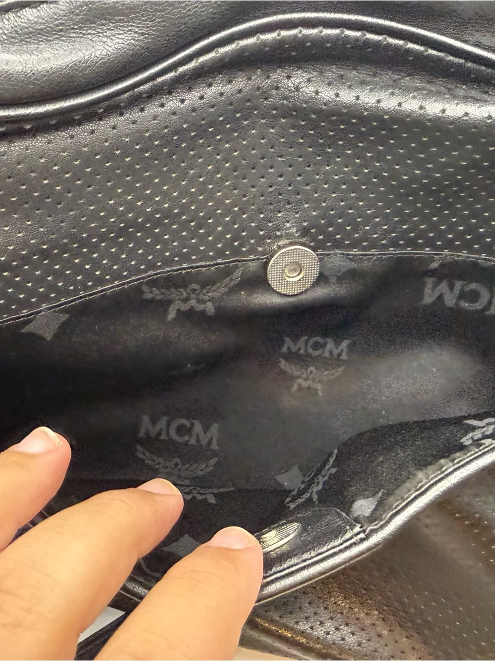 MCM Black Perforated Leather Messenger Bag with Gold Plaque